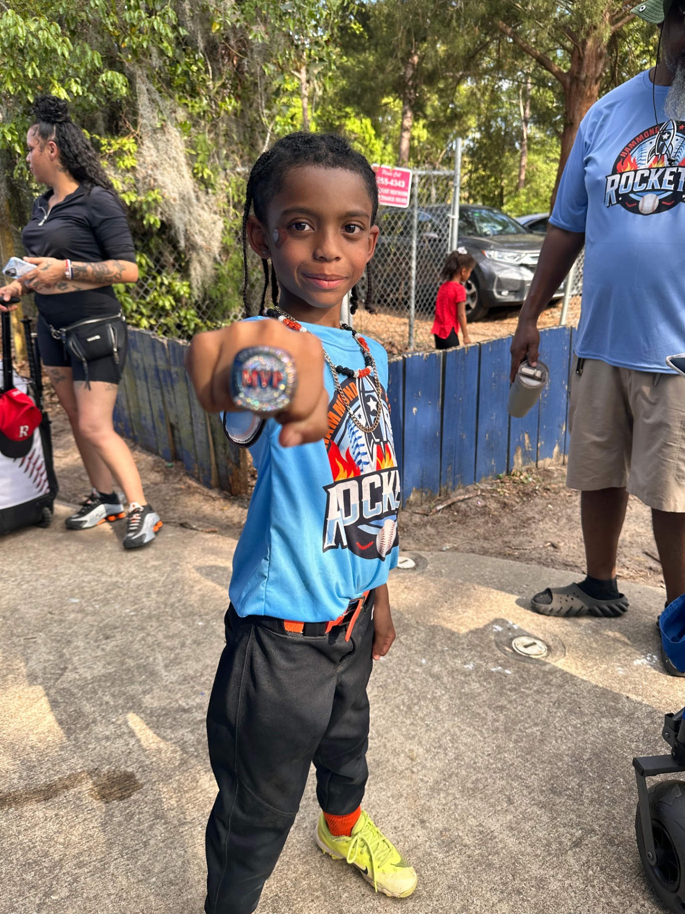Rockets player showing an MVP ring
